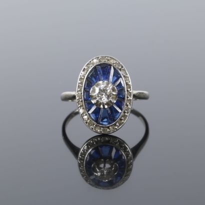White gold ring featuring an oval-shaped...