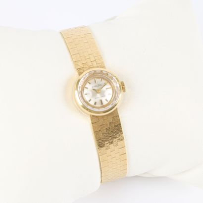 Women's gold watch with a bracelet; the mechanical...