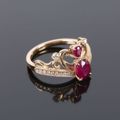 Rose gold ring featuring a tiara design set...