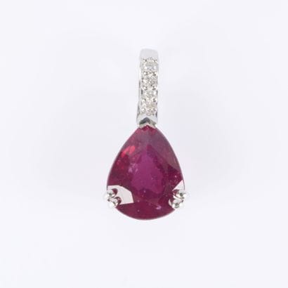 White gold pendant set with a treated pear-shaped...