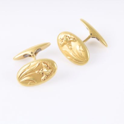Pair of yellow gold cufflinks with floral...