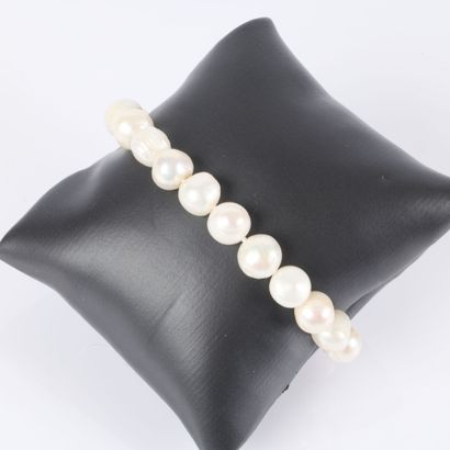 Bracelet orné de 20 perles d'eau douces blanches...