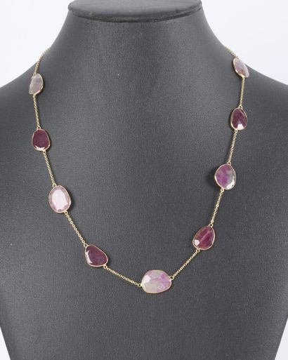 Gold necklace adorned with ruby roots set...
