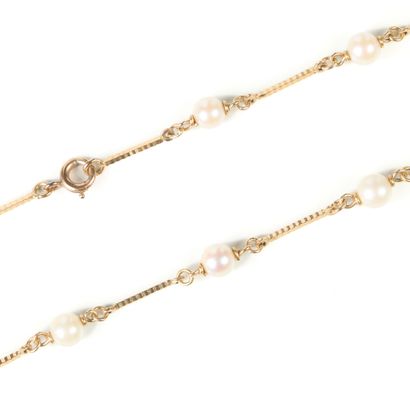 Gold necklace, baton links alternating with...