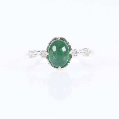 White gold ring set with an oval cabochon...