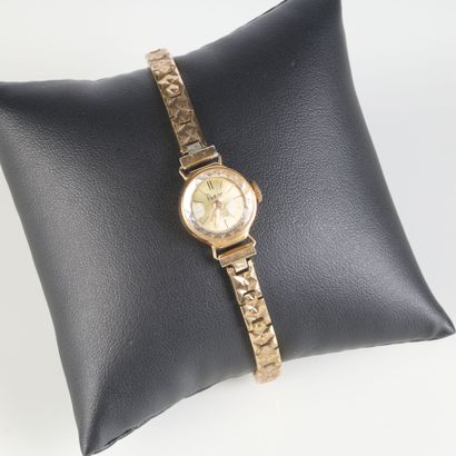 Gold ladies' wristwatch, mechanical movement...
