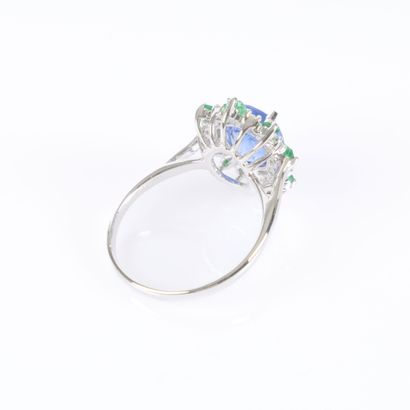 White gold daisy ring set with an unheated...