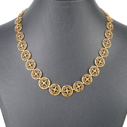 Gold necklace, decorated with falling filigree...
