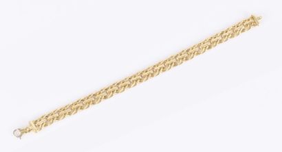 Bracelet en or maille fantaisie. Long. 19...