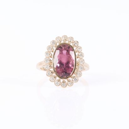 A striking rose gold daisy ring featuring...