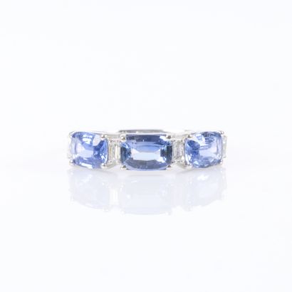 White gold half-eternity ring, set with 3...