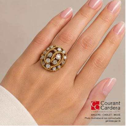 Gold and platinum ring featuring a twisted...