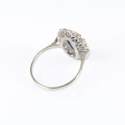 Two-tone gold daisy ring set in a closed...