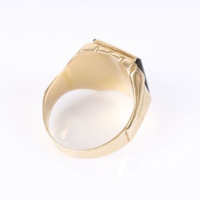 Gold signet ring set with an onyx inlay....