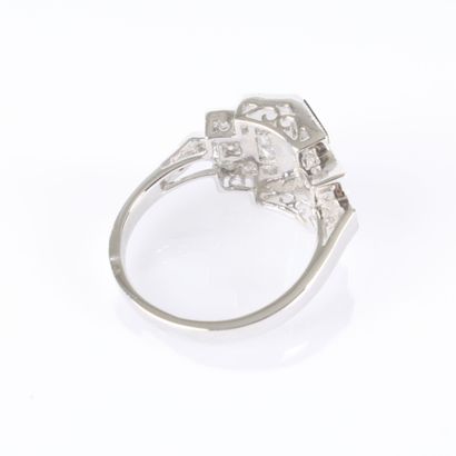 Art Deco-style platinum ring adorned with...