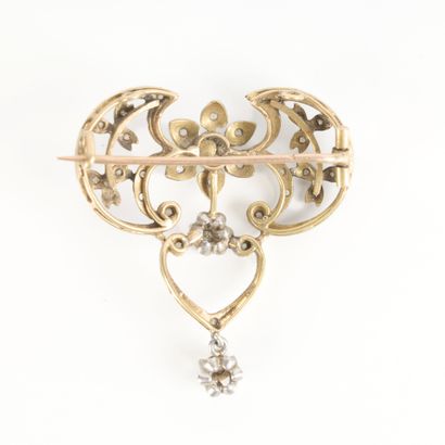 Two-tone gold pendant brooch set with floral...