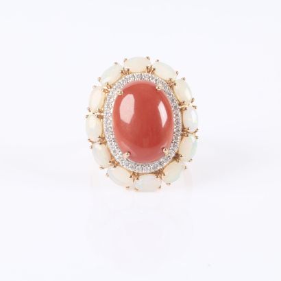 A striking rose gold daisy ring set with...