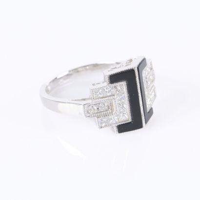 Art Deco-style platinum ring adorned with...