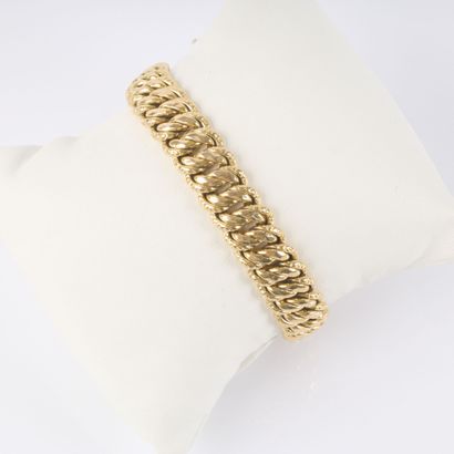 Bracelet en or maille américaine. 19 cm....