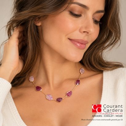 Gold necklace adorned with ruby roots set...