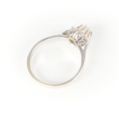 Solitaire ring in white gold set with a modern...