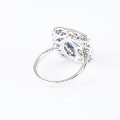 Platinum ring set with a cabochon sapphire...