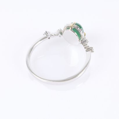 White gold ring set with an oval cabochon...