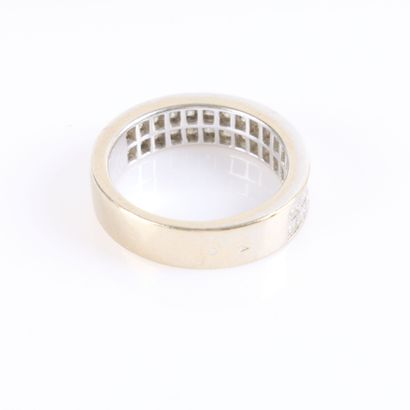 White gold ring set with princess-cut diamonds...