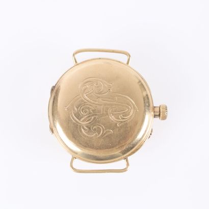 Gold watch bracelet; the dust cover is also...