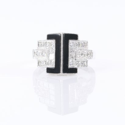 Art Deco-style platinum ring adorned with...