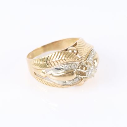Two-tone gold ring with a leaf motif, set...