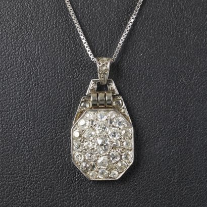 Art Deco pendant featuring a pavé setting...