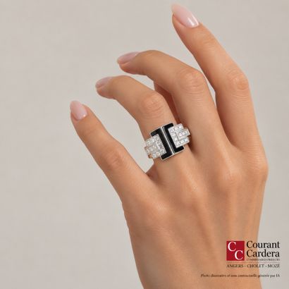 Art Deco-style platinum ring adorned with...