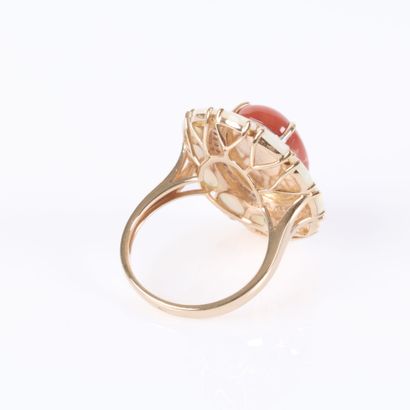 A striking rose gold daisy ring set with...