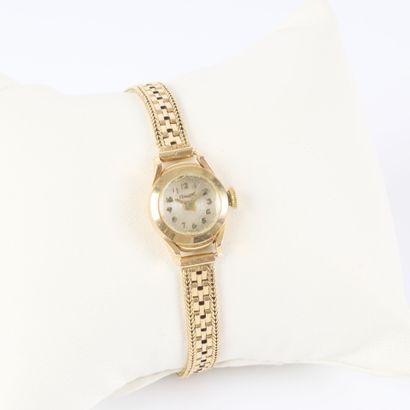 Women's gold watch with a gold bracelet;...