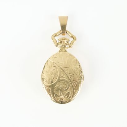 Oval engraved gold pendant watch, quartz...