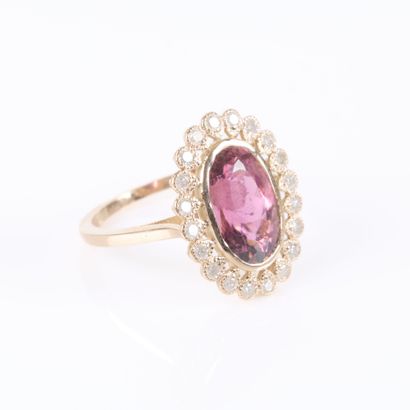 A striking rose gold daisy ring featuring...