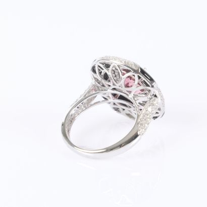 Stunning white gold ring set with an oval-cut...