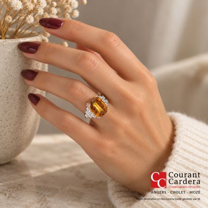 White gold ring set with a treated orange...
