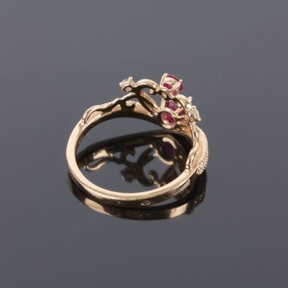 Rose gold ring featuring a tiara design set...
