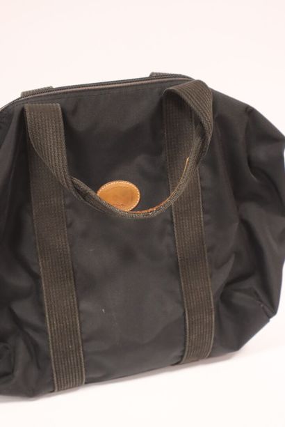 LONGCHAMP
Sac de sport en toile noir
élément...
