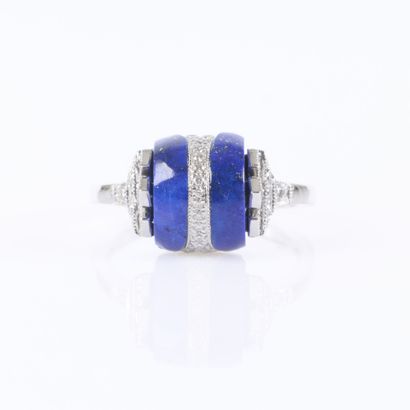 Platinum ring featuring two lapis lazuli...