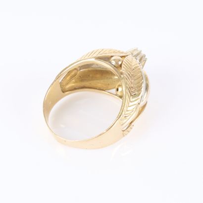 Two-tone gold ring with a leaf motif, set...