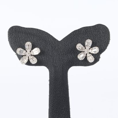 Pair of white gold flower-shaped earrings,...