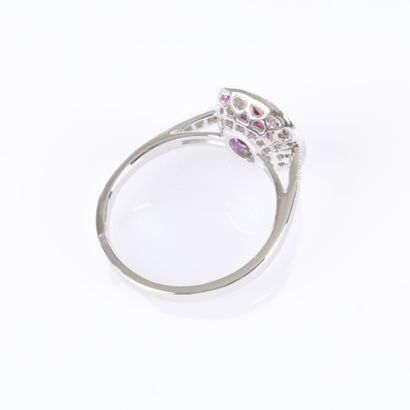 .Platinum ring set with rubies and diamonds...