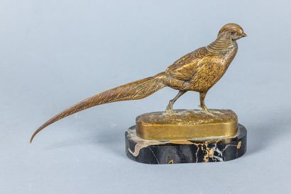 A. JACQUEMART: Petit bronze à patine mordorée...