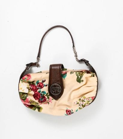 KENZO


Sac en toile fleurie et cuir marron...