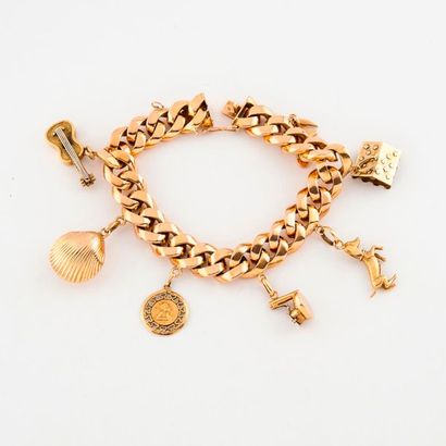 Bracelet gourmette en or jaune (750) retenant...