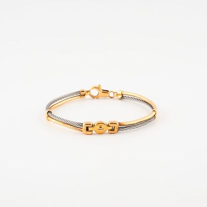 Bracelet ouvrant en or jaune (750) et filins...