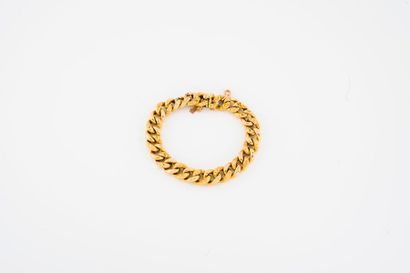 Bracelet gourmette en or jaune (750) creux,...